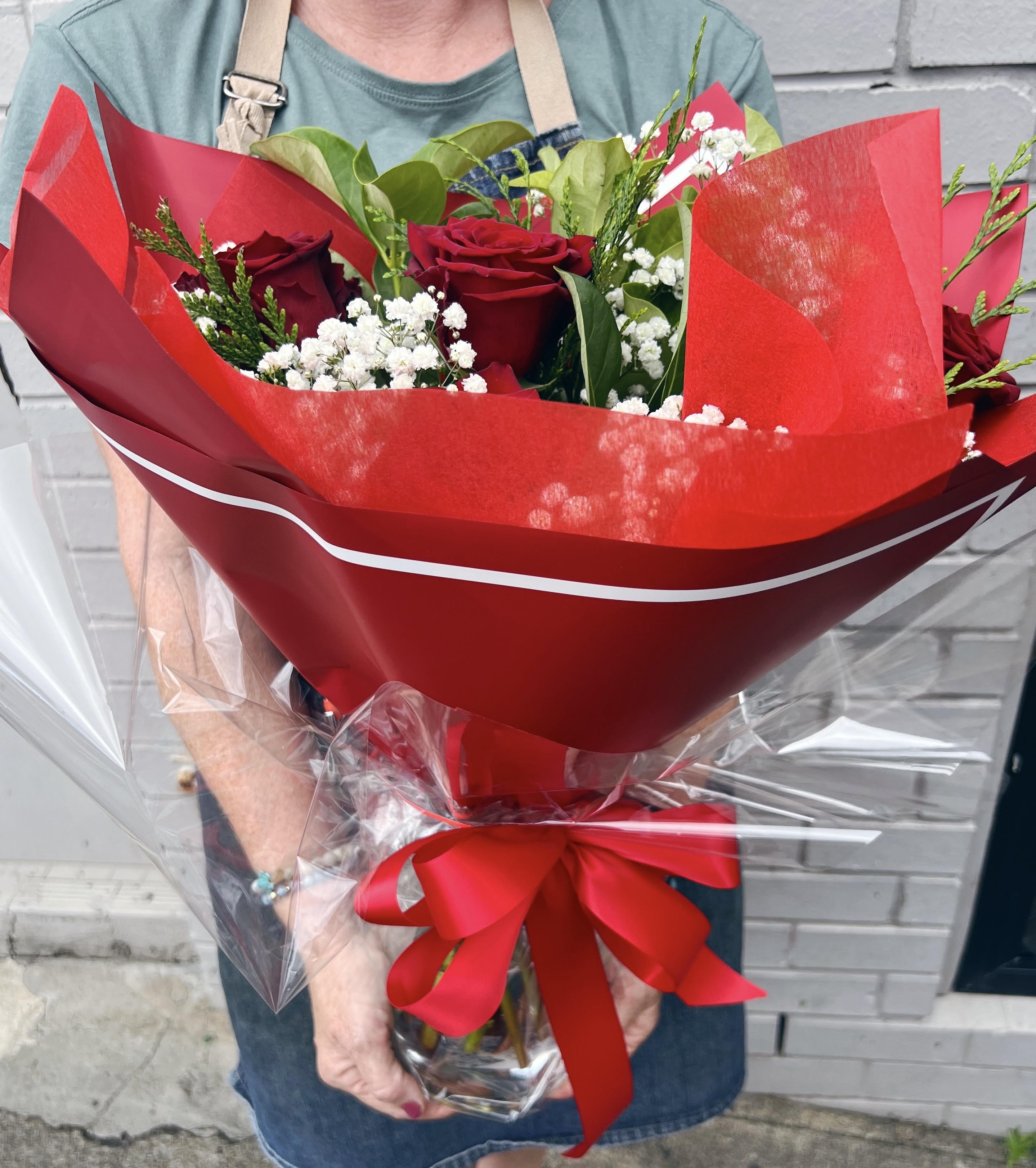 half dozen in a glass vase